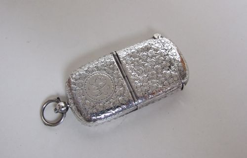 A Victorian Chester Silver Sovereign/vesta Combi.