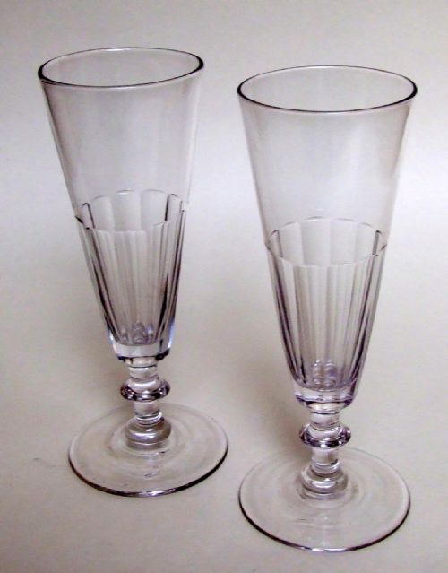 A Pair of Early Victorian Cut Glass Champagne Flutes.