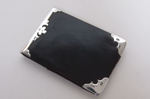 A Superb Victorian Silver Mounted Leather Wallet.