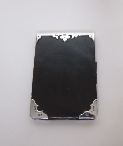 fig 1. A superb Victorian silver mounted leather wallet.