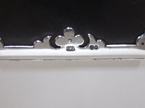 fig 2. A superb Victorian silver mounted leather wallet.
