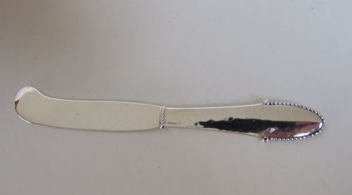 A Superb Arts & Crafts Georg Jensen Silver Butterknife.