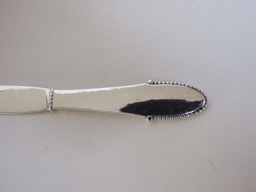 fig 1. A superb Arts & Crafts Georg Jensen silver butterknife.