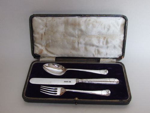 A Handsome Arts & Crafts Silver Boxed Christening Set.