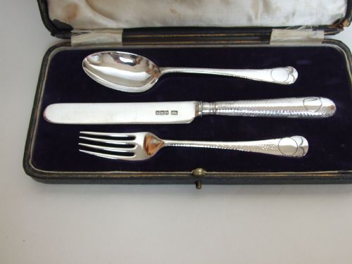 fig 1. A handsome Arts & Crafts silver boxed Christening set.