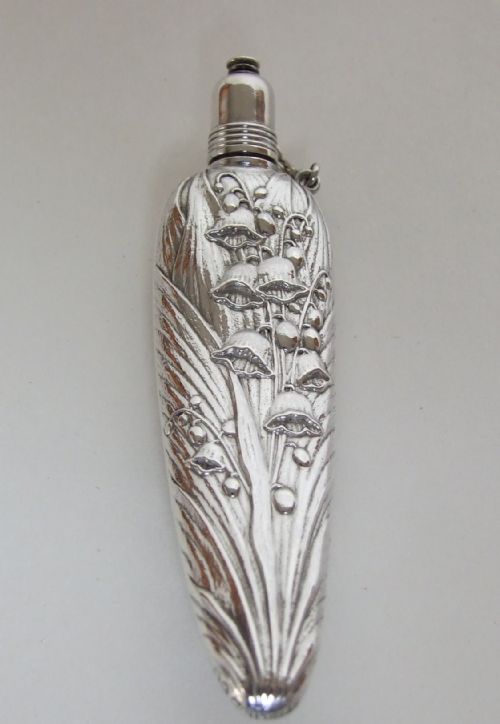 A Stunning Sterling Silver Scent Flask with Lily of the Valley Motifs.