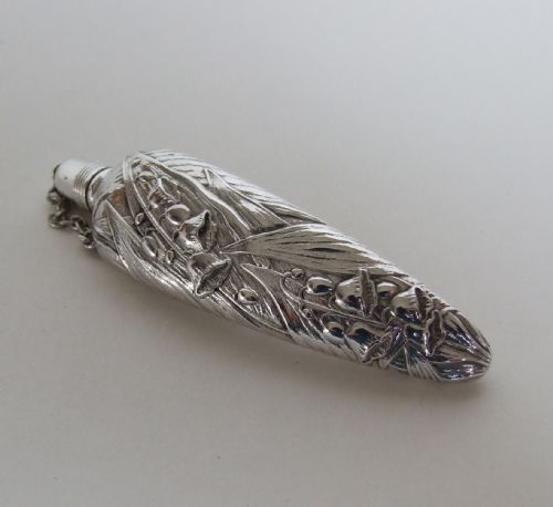 fig 1. A stunning Sterling silver scent flask with Lily of the Valley motifs.