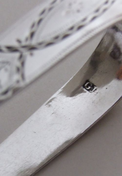 fig 1. A beautiful pair of late 18th Century silver tongs.