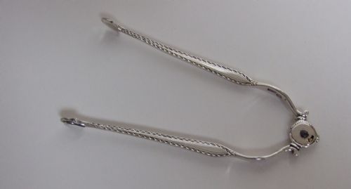 A Rare Pair of Mid 18th Century Silver Tongs.