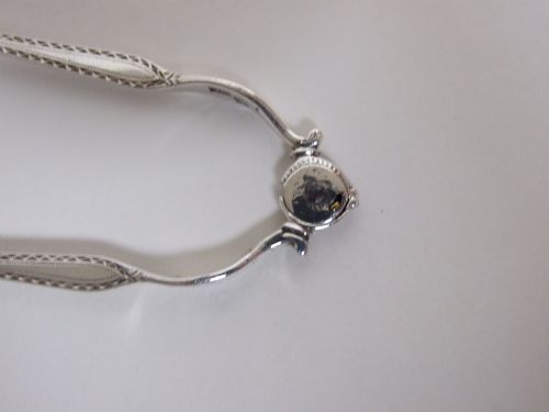 fig 1. A rare pair of mid 18th Century silver tongs.