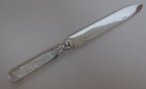 A Late Victorian Silver Plated Wedding Cake Knife.