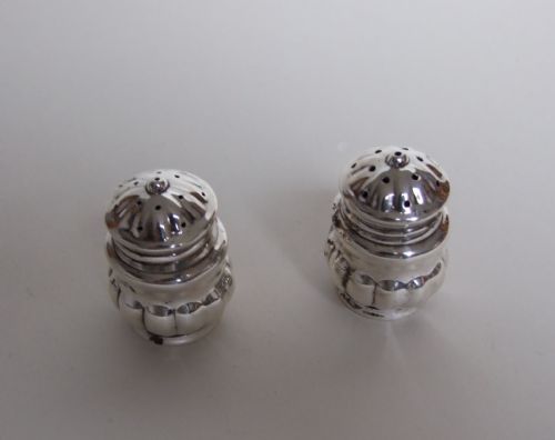 A Charming Pair of German Silver Salt & Pepper Pots.
