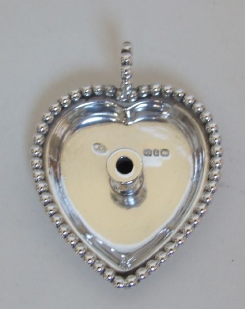 fig 1. A wonderful Victorian silver miniature go-to-bed.