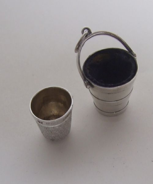 fig 1. A rare mid Victorian silver thimble holder and thimble.