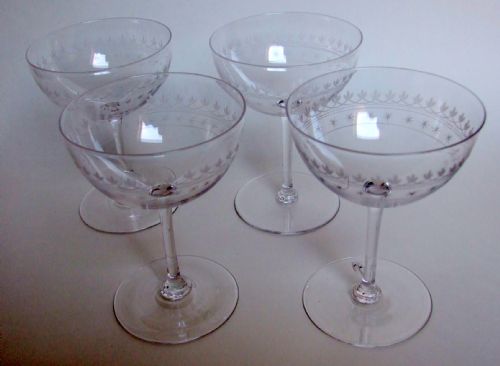 A Lovely Set of Four Victorian Etched Champagne Glasses.