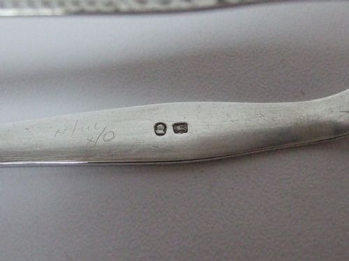 fig 1. A pair of acorn end Hester Bateman silver tongs.