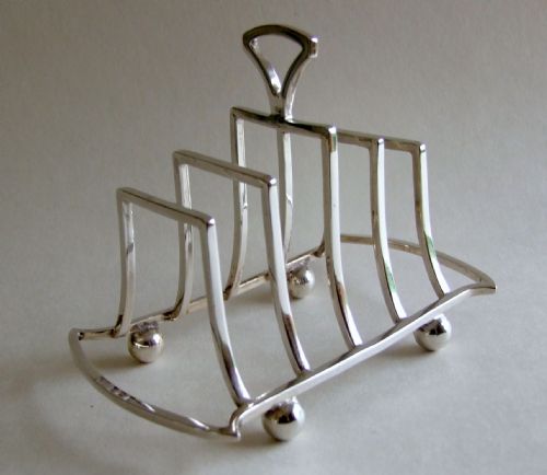 An Attractive Art Deco Silver Toastrack.