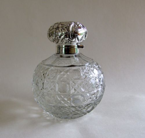 A Gorgeous Silver Mounted Edwardian Cologne Bottle.