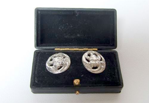 A Charming Pair of Cast Silver Victorian Buttons