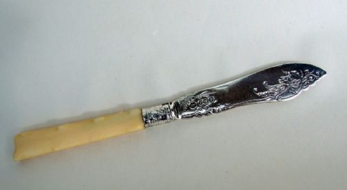 A Gorgeous Victorian Silver Butter Knife.