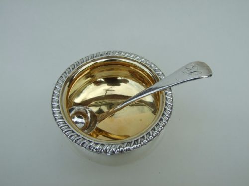 fig 1. A handsome silver gilt condiment bowl and ladle.