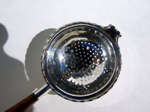 fig 1. A gorgeous silver tea strainer.