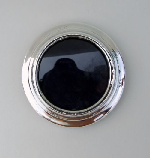 A Small Silver Photo Frame of Circular Form.