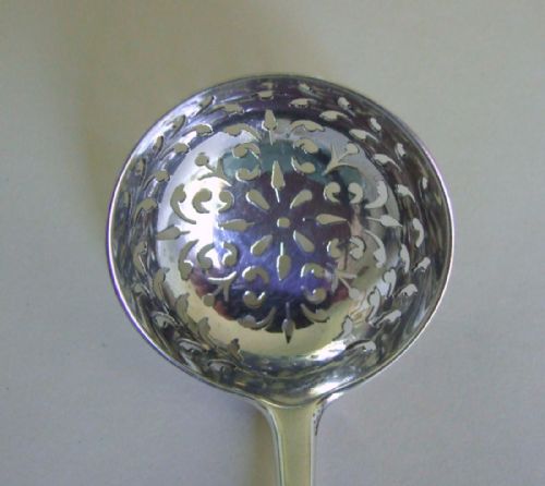 fig 1. A Victorian silver sifter spoon by George Adams.