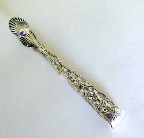 A Gorgeous Pair of Pierced Silver Tea Tongs in the Georgian Style.