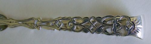 fig 1. A gorgeous pair of pierced silver tea tongs in the Georgian style.