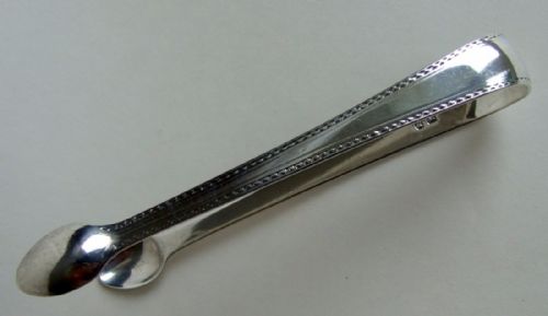 A Charming Pair of 18th Century Silver Tongs.