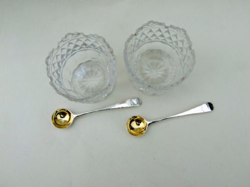 fig 2. A handsome pair of cut glass Regency condiment tubs and silver spoons.