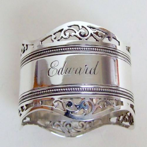 fig 1. A fine  silver napkin ring engraved 'Edward'.