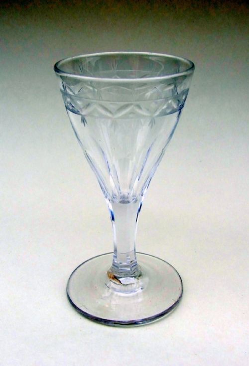 An 18th Century Etched and Cut Dram Glass.