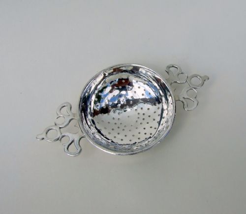 A Gorgeous George V Silver Tea Strainer.