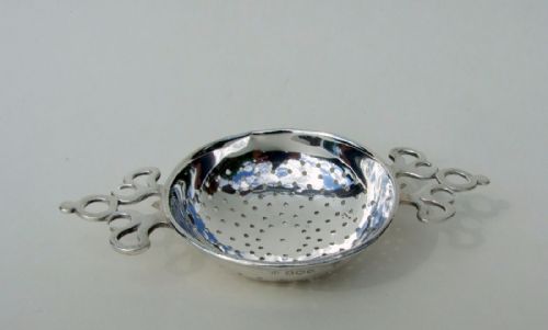 fig 1. A gorgeous George V silver tea strainer.