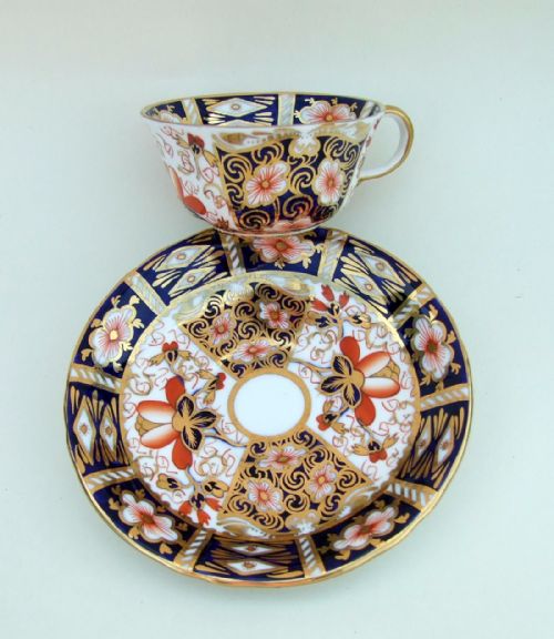 A Crown Derby Tea Cup and Saucer in Imari Colours.