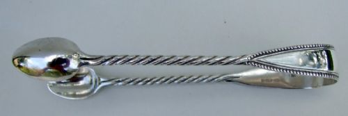 A Gorgeous Pair of Victorian Silver Tongs.