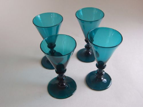 A William IV Set of Four Green Wine Flutes.