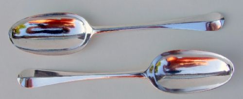 A Fabulous Pair of George I Silver Rat-tail Serving Spoons.