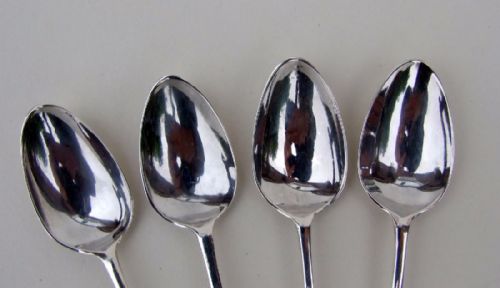 fig 1. A charming set of four 18th Century silver demi-tasse spoons.