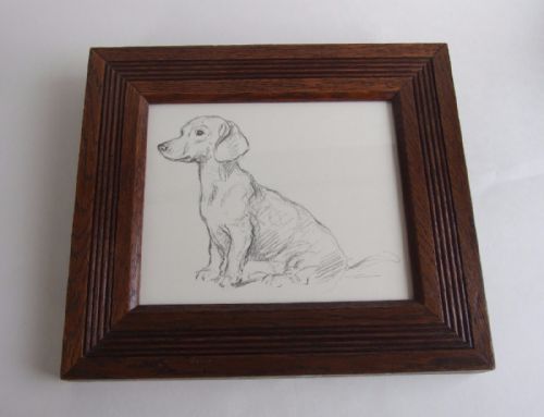 fig 1. A vintage Lucy Dawson print of a Dachshund in an oak frame.