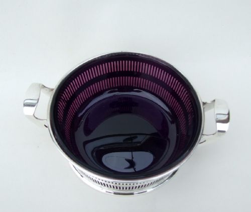 fig 1. A gorgeous pierced silver twin handled dish with amethyst glass liner.