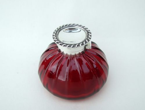 fig 1. A fabulous Victorian silver mounted cranberry inkwell.