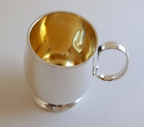 fig 1. A good quality Edwardian silver gilt Christening mug.
