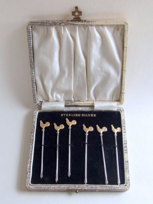 A Rare Set of Sterling Silver Gilt Cockerel Cocktail Sticks in the Original Box.
