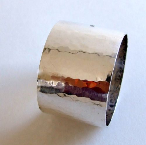 A Superb Heavy Gauge Silver Napkin Ring in the Arts & Crafts Style.