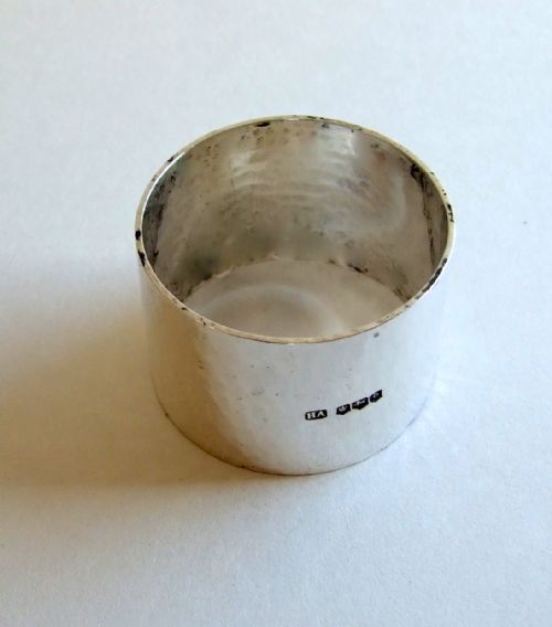 fig 1. A superb heavy gauge silver napkin ring in the Arts & Crafts style.