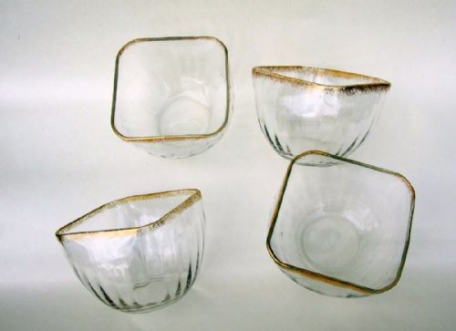 A Gorgeous Set of Four French Ribbed and Shaped Bowls.