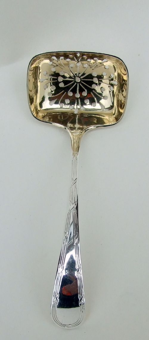 A Stylish George V Silver Gilt Sifter Spoon.